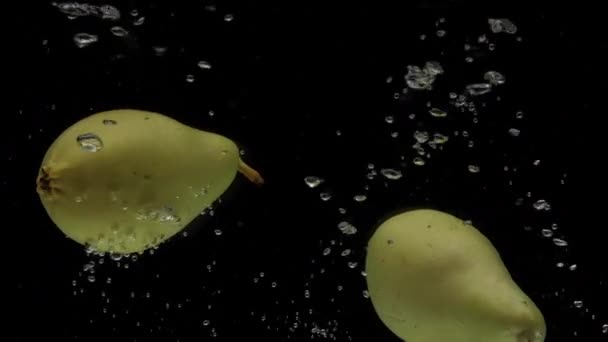 Slow Motion Two Pear Falling Transparent Water Black Background Fresh — Stock Video