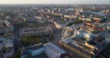 Aerial view Kyiv cityscape at beautiful sunset. Drone shot contract area at sunrise. Drone flies over old Kiev - podil