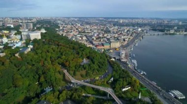 Aerial view beautiful Kyiv cityscape river station, postal and contract area on a sunny spring day. Drone shot Kiev building. Capital of Ukraine 