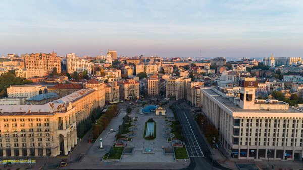 Independence Square. Ukraine. Kyiv. September 12, 2021. Aerial photo Maidan Nezalezhnosti. Drone shot historical Buildings at sunrise or sunset in center Kiev. Revolution of pride. Orange Revolution