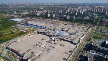 Aerial view modern shopping center Respublika in Kyiv, Ukraine. Drone shot cityscape. Building Residential complex Respublika. Construction of residential premises. Capital of Ukraine