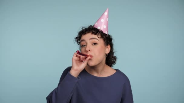 Close Happy Curly Woman Birthday Cap Blowing Whistle Celebrating Holiday — Stock Video