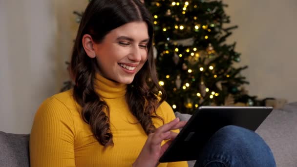 Close Smiling Woman Buys New Year Gifts Internet Using Tablet — Vídeos de Stock