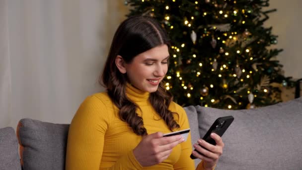 Smiling Woman Enters Credit Card Code Pay New Year Gifts — Stok video