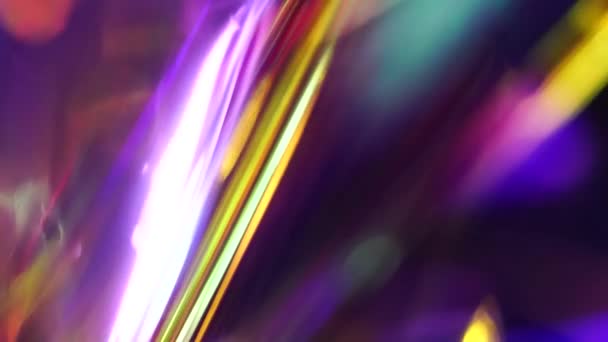 Blurred neon blue purple gold abstract blurry background. Soft rainbow color holographic gradient. Hologram glitch. Light through a crystal and smoke — Stock Video