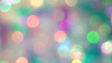 Sihirli Noel ışıkları ve bokeh. Parti için hafif bulanık holografik arka plan. Renkli yanardöner parlak parçacıklar