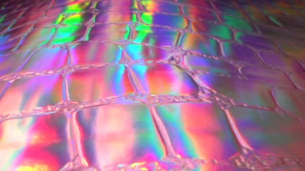 Rainbow Holographic Snake Skin synthetic leather. Iridescent Fabric Texture Closeup. Blue and purple neon retro abstract background — Stockvideo