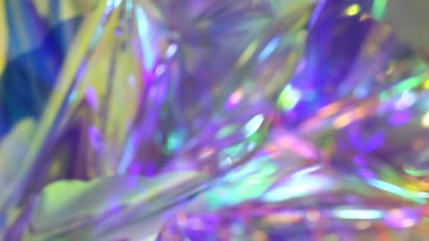 Defocused purple very peri pink blue light crystal. Festive neon abstract holographic modern background for new year party. Rainbow unicorn colors — стоковое видео
