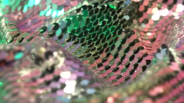 Fabric for a festive dress with pink, purple and silver sequins. Textile background for a romantic holiday — Stock Video