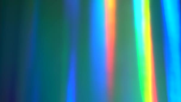 Grönt och blått spektrum illusion ljus visar. Regnbågens färger lutning animation. Flyttar mjuk suddig bakgrund. Färgerna varierar beroende på position, vilket ger släta färgövergångar — Stockvideo