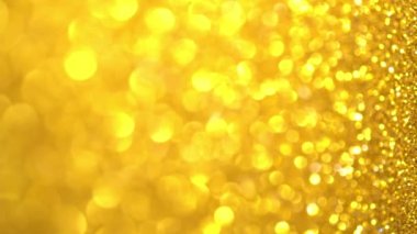Ramazan Bayramı Altın Parıltısı Arkaplanı. Sihirli gece tatil ışıkları ve bokeh, parlak dikey dokular. Parlak şenlikli arka plan