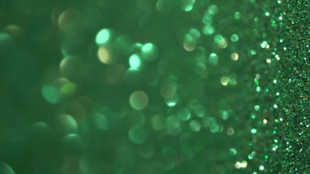 Ramadan Green Glitter Vertical Background. Holiday lights bokeh, magic christmas lights. Shiny texture, , flying particles form a beautiful bokeh. Shining festive backdrop — Stock Video
