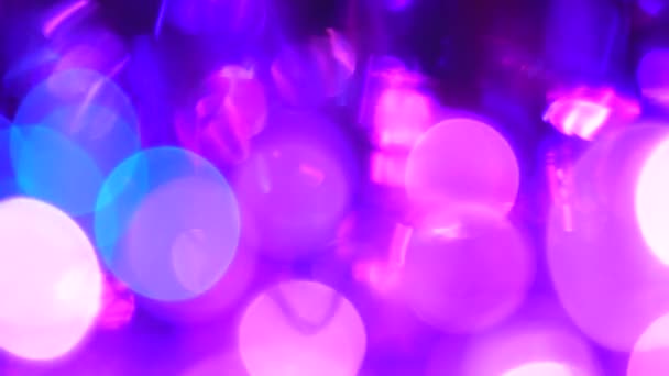 Neon Hintergrund abstrakte Bokeh-Kreise. Lila rosa blaue Farben — Stockvideo