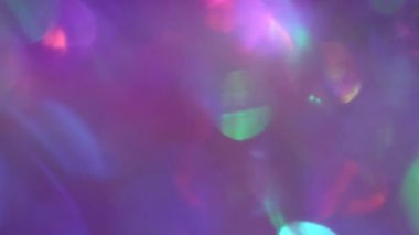 Gökkuşağı holografik kristal gölgeleri. Bulanık holografik tatil ışıkları.