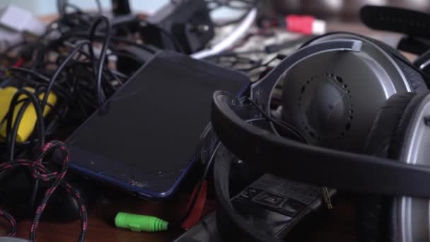 Electronic waste or e-waste, discarded electrical or electronic devices. Used electronics which are destined for refurbishment, reuse, resale, salvage recycling through material recovery or disposal — Stock Video