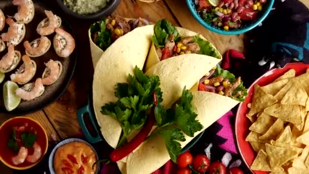 A burrito is a dish in Mexican and Tex-Mex cuisine, Shrimp appetizer, Nachos, Pico de gallo, Salsa — Video Stock