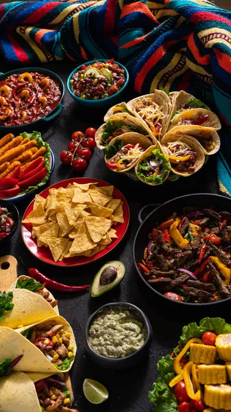 Mexican food at table Burrito, Pico de gallo, Guacamole, Taco, Fajita, Salsa sauce, Corn Tortillas, Nachos, Seafood appetizer — Stock Photo, Image