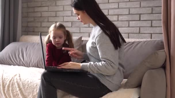 Stay-at-home mom job searching. Stressed mother and baby — Stockvideo