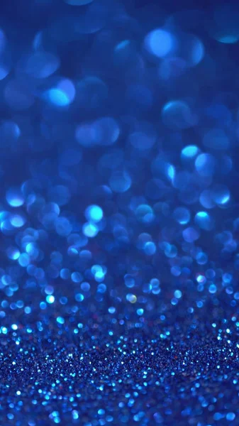 Superfície azul brilhante gira. fundo bokeh mágico — Fotografia de Stock