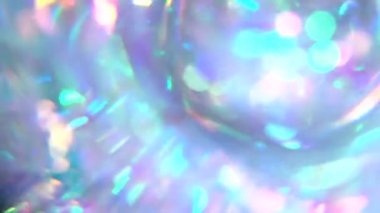 Lens flare. Magic Rainbow Crystal Reflects Light. Abstract blurred background for a holiday. Optical illusion, Multicolored bokeh