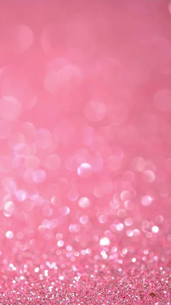 ピンクの輝きのお祝いの焦点を当てたライトの背景。ラマダーンとアイドの休日のための素晴らしい背景。美しい魔法のボケ — ストック写真