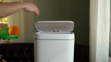 Disposable plastic tableware garbage. Contactless Smart Touch Trash Can. High quality 4k footage
