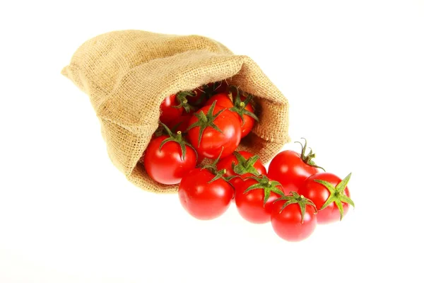 Jute bag fill of tomatoe — Stock Photo, Image