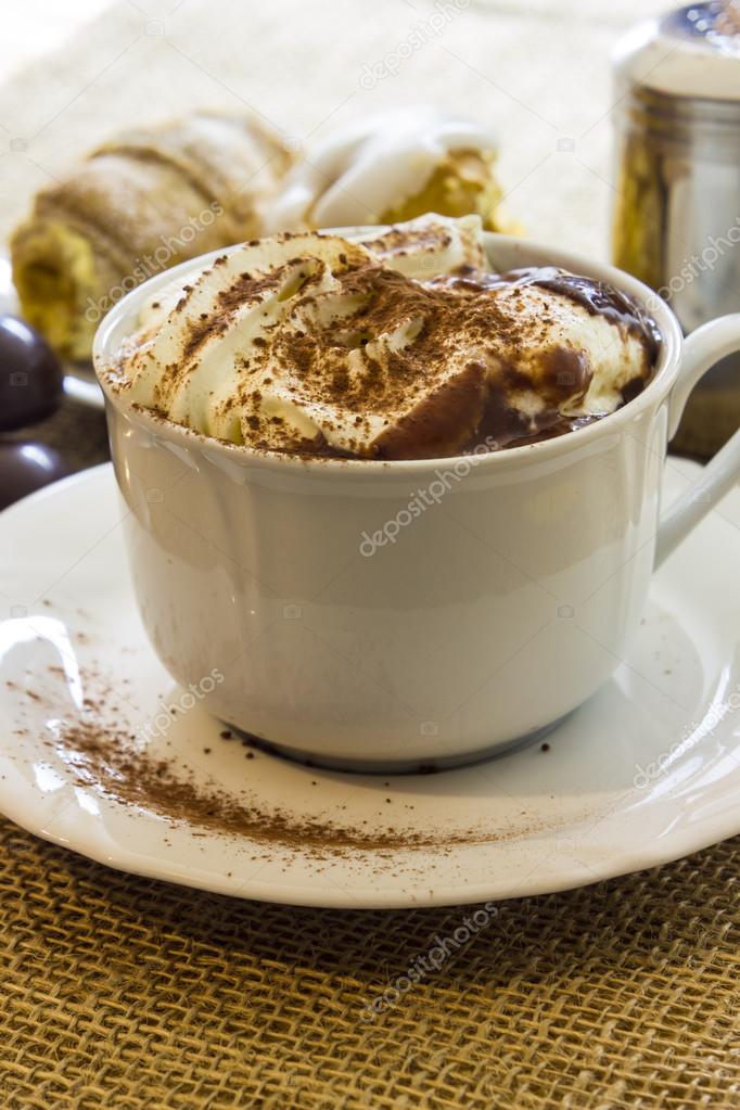 Hot chocolate cup with whipped cream