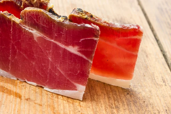 Tasty slices of Italian speck — Stock Photo, Image