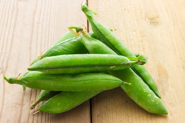 Some green peas — Stock Photo, Image