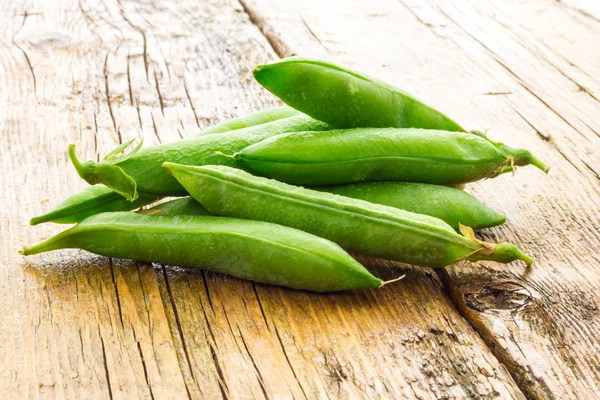 Some green peas — Stock Photo, Image