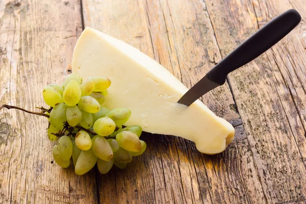 Fatia de queijo scamorza da Itália — Fotografia de Stock
