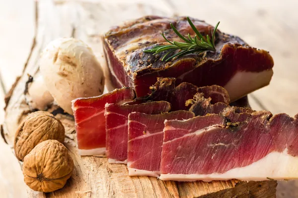 Tasty slices of Italian speck — Stock Photo, Image