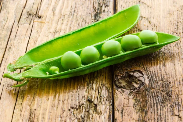 Some green peas — Stock Photo, Image