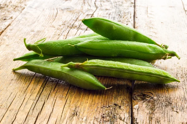 Some green peas — Stock Photo, Image