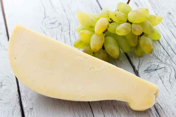 Fatia de queijo scamorza da Itália — Fotografia de Stock