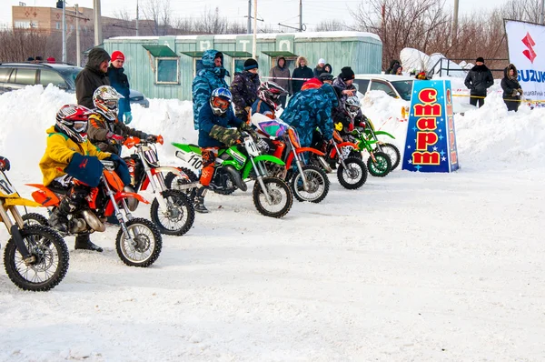 Winter Motocross competitions among children — Stock Photo, Image