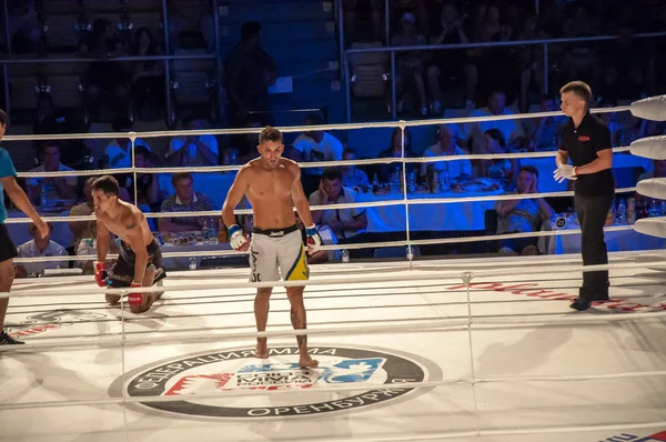 MMA fights without rules. Agoni Romero, Spain and Rinat Kultumanov, Russia. — Stock Photo, Image