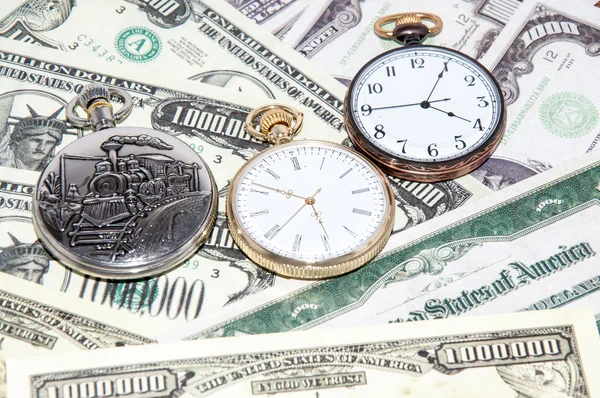 Pocket watches and money — Stock Photo, Image