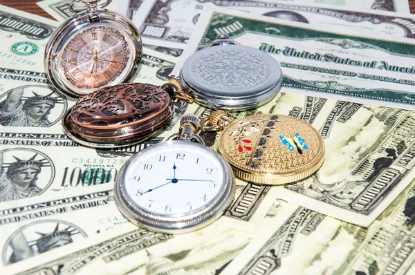 Pocket watches and money — Stock Photo, Image