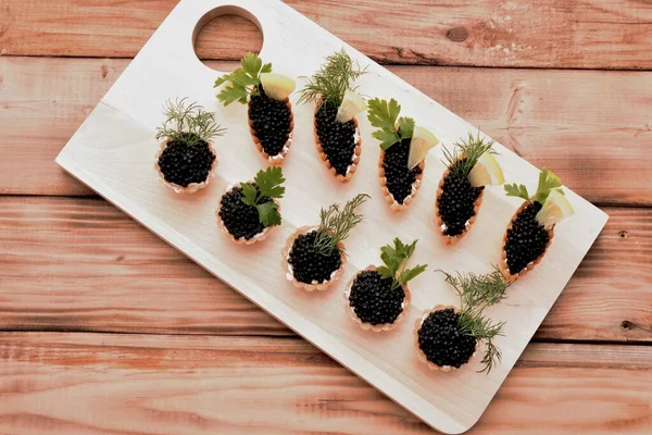 Tartlets Caviar Fresh Herbs New Year Table — Stockfoto