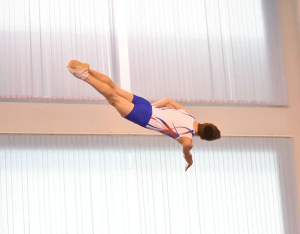 Young Men Training Trampoline Jumping Preparing Competitions — стокове фото