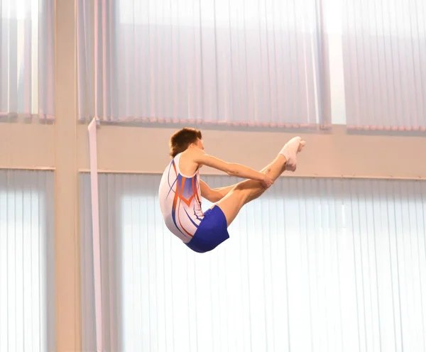 Young Men Training Trampoline Jumping Preparing Competitions — стоковое фото