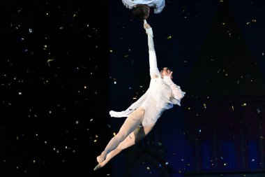  Orenburg, Russia - October 12, 2019: Aerialists perform their number at the circus arena 