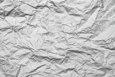 Eski buruşmuş grafit kağıt arkaplan, fotokopi alanı boş, dalgalı kırışık arkaplan.