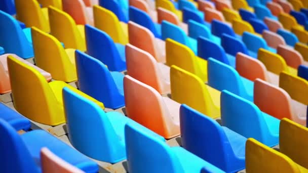 Multi Colored Chairs Stadium Rows Empty Plastic Seats Arena — Stock Video