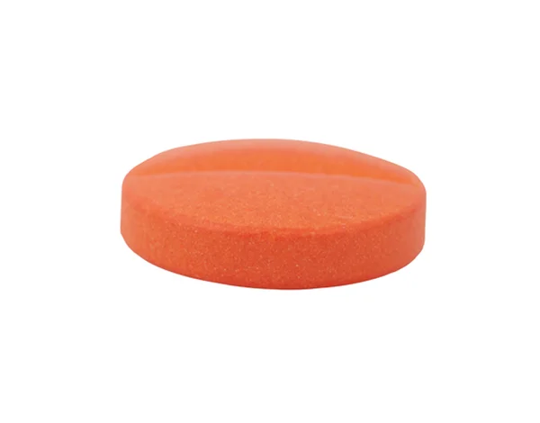 Pillola arancione isolata su sfondo bianco — Foto Stock