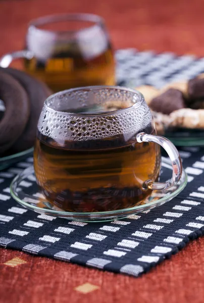 Two cups of tea with two plates with cookies — Stock Photo, Image