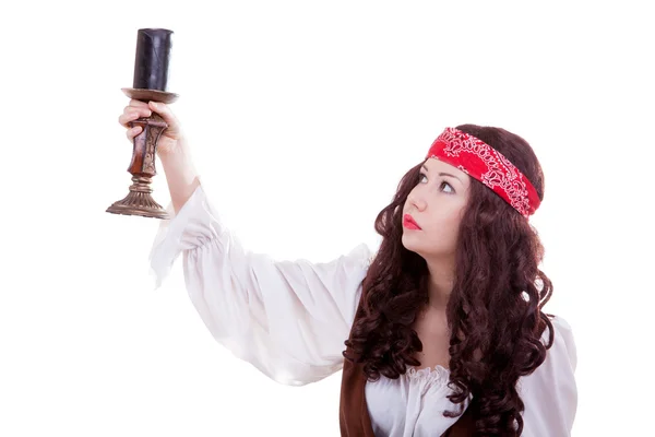 Menina pirata com uma vela na mão — Fotografia de Stock