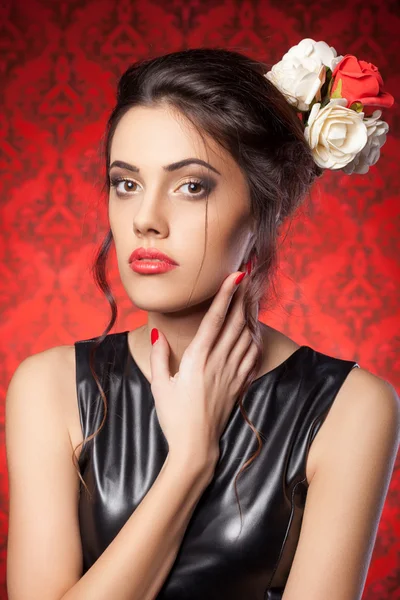 Sensual woman in red vintage room — Stock Photo, Image